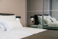 Posteľ alebo postele v izbe v ubytovaní Hotel - Teranea City Hvar