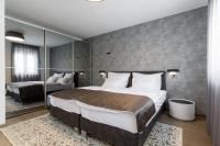 Posteľ alebo postele v izbe v ubytovaní Hotel - Teranea City Hvar