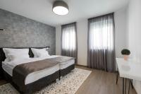 Posteľ alebo postele v izbe v ubytovaní Hotel - Teranea City Hvar