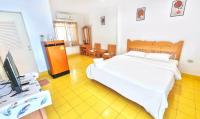 Postel nebo postele na pokoji v ubytování The Golden View Resort สวนผึ้ง