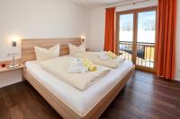 Seehotel und Appartements Schnöllerにあるベッド