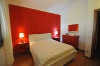 Łóżko lub łóżka w pokoju w obiekcie DOLCE MARE, casa vacanze a due passi dal mare!