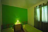 Łóżko lub łóżka w pokoju w obiekcie DOLCE MARE, casa vacanze a due passi dal mare!