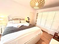 Posteľ alebo postele v izbe v ubytovaní Chalet La Caballa Playa la Barrosa
