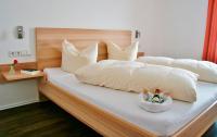 Seehotel und Appartements Schnöllerにあるベッド