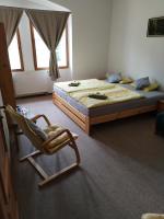 Postel nebo postele na pokoji v ubytování Hotel U Zvonu