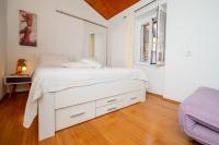 Posteľ alebo postele v izbe v ubytovaní Apartments Vitoria