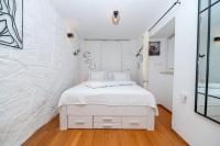 Posteľ alebo postele v izbe v ubytovaní Apartments Vitoria
