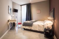 A bed or beds in a room at Roma 2B