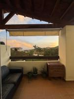 A balcony or terrace at Arenal Golf Apartment