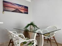 A seating area at Arenal Golf Apartment