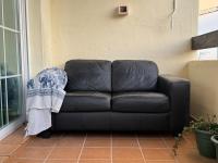 A seating area at Arenal Golf Apartment