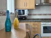 A kitchen or kitchenette at Arenal Golf Apartment