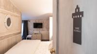 Televízia a/alebo spoločenská miestnosť v ubytovaní Il Castagnolo Country B&B