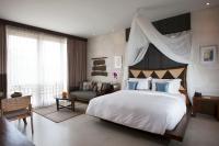 Tejaprana Resort & Spaにあるベッド