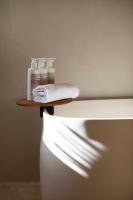 a shelf on top of a toilet in a room at Can Jaume by Ocean Drive in Ibiza Town