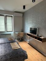 TV a/nebo společenská místnost v ubytování Apartment Rotonda
