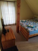 Postel nebo postele na pokoji v ubytování Hotel U Zvonu