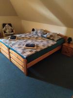 Postel nebo postele na pokoji v ubytování Hotel U Zvonu