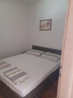 Łóżko lub łóżka w pokoju w obiekcie Be-Bu-Mar Apartments