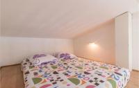 Posteľ alebo postele v izbe v ubytovaní 2 Bedroom Amazing Home In Pula
