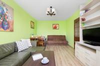 Televízia a/alebo spoločenská miestnosť v ubytovaní Funkcjonalne i Komfortowe Apartamenty Sun Seasons 24 w Kołobrzegu by Noclegi Renters