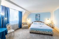 Postel nebo postele na pokoji v ubytování Hotel Trumf