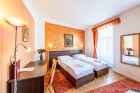 Postel nebo postele na pokoji v ubytování Hotel Trumf