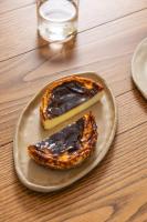 two pieces of food on a plate on a table at Casale Oleo in Montiano