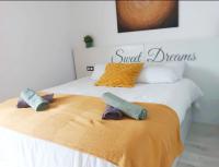 Posteľ alebo postele v izbe v ubytovaní Apartamento Lances playa tarifa