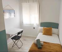 Posteľ alebo postele v izbe v ubytovaní Apartamento Lances playa tarifa