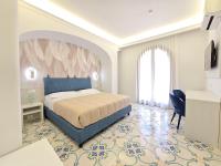 A bed or beds in a room at Villa Le Zagare Relais & SPA