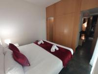 A bed or beds in a room at Cituspace Sandoval