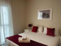 A bed or beds in a room at Cituspace Sandoval