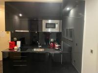 A kitchen or kitchenette at Cituspace Sandoval