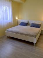Posteľ alebo postele v izbe v ubytovaní TANY