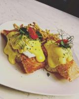 a plate of food with cheese and french fries at Hotel Bothwell Sedalia Central District, an Ascend Collection Hotel in Sedalia