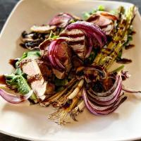 a plate of food with meat and vegetables on it at Hotel Bothwell Sedalia Central District, an Ascend Collection Hotel in Sedalia