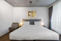 Clarion Apartments South Melbourneにあるベッド