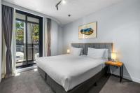 Clarion Apartments South Melbourneにあるベッド
