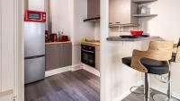 Kuchnia lub aneks kuchenny w obiekcie L'Escapade Urbaine - Cosy et central
