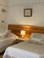 Łóżko lub łóżka w pokoju w obiekcie Gîte La loge 142 route de CARPENTRAS 84210 VENASQUE