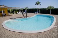 The swimming pool at or close to meadow luxury villa