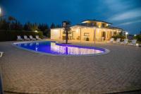 The swimming pool at or close to meadow luxury villa