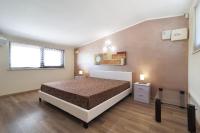 A bed or beds in a room at meadow luxury villa