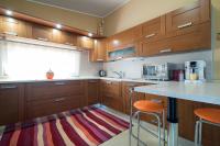 A kitchen or kitchenette at meadow luxury villa