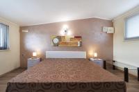 A bed or beds in a room at meadow luxury villa