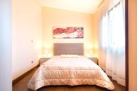 A bed or beds in a room at meadow luxury villa