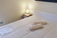 A bed or beds in a room at meadow luxury villa