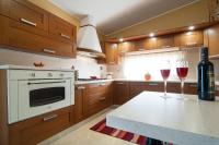A kitchen or kitchenette at meadow luxury villa